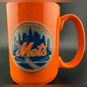 MLB NY Mets 12oz ceramic mug. Orange and Blue w/ a metal etched logo.